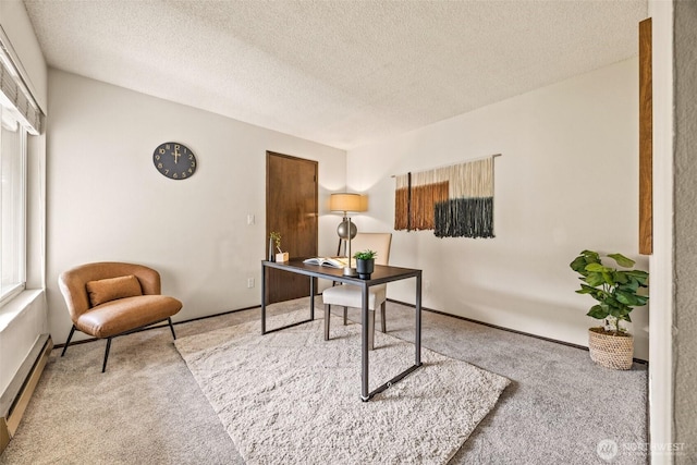 office with carpet, a textured ceiling, and a baseboard radiator