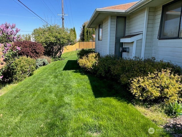 view of yard with fence