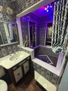2232 177th Pl SW, Lynnwood, WA 98037 - bathroom featuring vanity, toilet, and tile walls