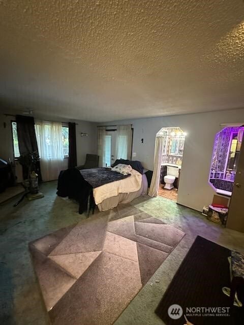 2232 177th Pl SW, Lynnwood, WA 98037 - bedroom featuring a textured ceiling, carpet, and ensuite bathroom