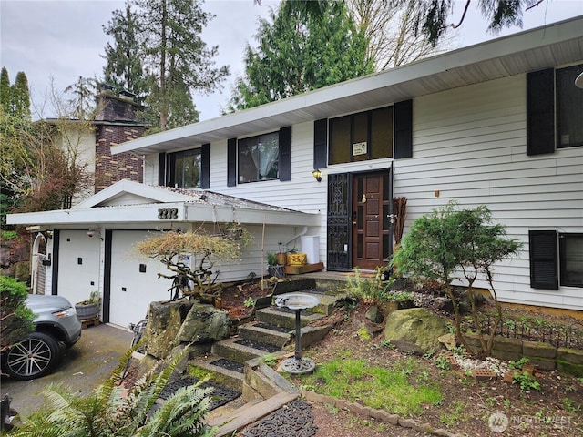 2232 177th Pl SW, Lynnwood, WA 98037 - bi-level home featuring aphalt driveway
