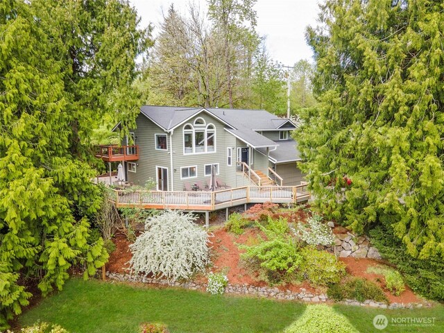 rear view of house with a deck