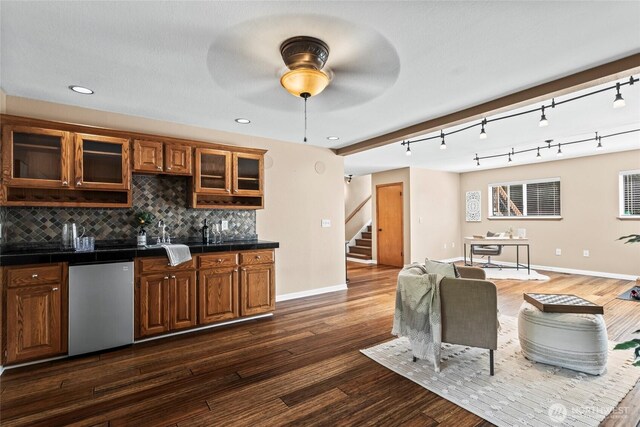 interior space featuring a ceiling fan, baseboards, recessed lighting, dark wood-style floors, and stairway