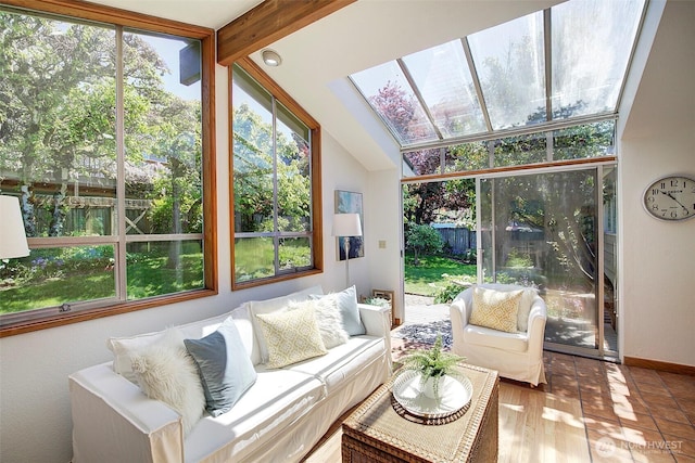 sunroom / solarium featuring a skylight