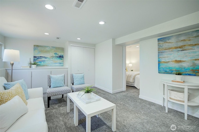 living area featuring baseboards, recessed lighting, carpet floors, and visible vents