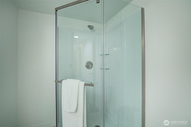 full bath featuring a stall shower