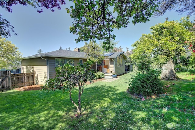 view of yard featuring fence