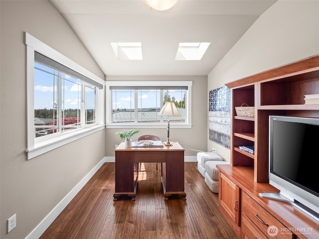 home office featuring baseboards, lofted ceiling with skylight, and dark wood-style floors
