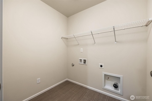 laundry area with washer hookup, laundry area, electric dryer hookup, hookup for a gas dryer, and baseboards