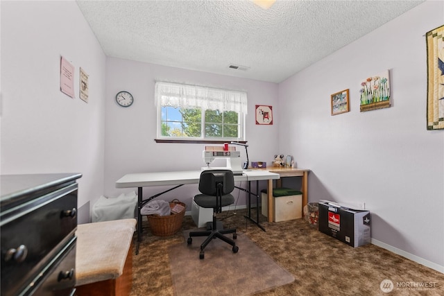 109 Lime St, Omak, WA 98841 - home office with visible vents, a textured ceiling, and carpet