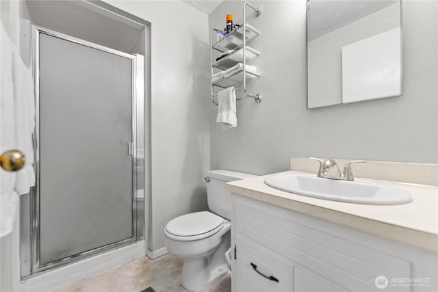 109 Lime St, Omak, WA 98841 - bathroom with vanity, a stall shower, and toilet
