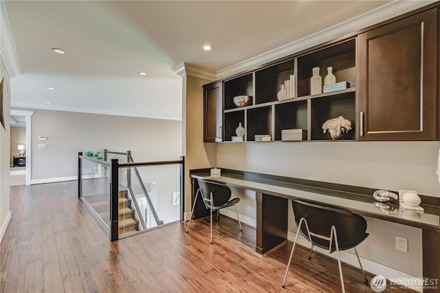 1985 Bayview St, Blaine, WA 98230 - office space featuring built in study area, ornamental molding, baseboards, wood finished floors, and recessed lighting