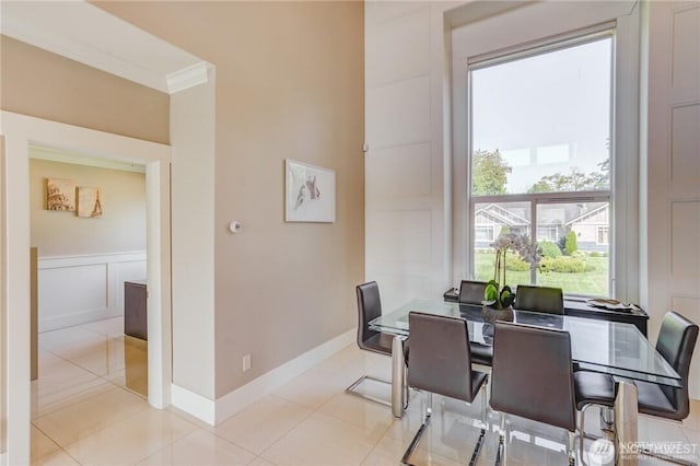 1985 Bayview St, Blaine, WA 98230 - dining space with ornamental molding, a decorative wall, baseboards, and a wainscoted wall