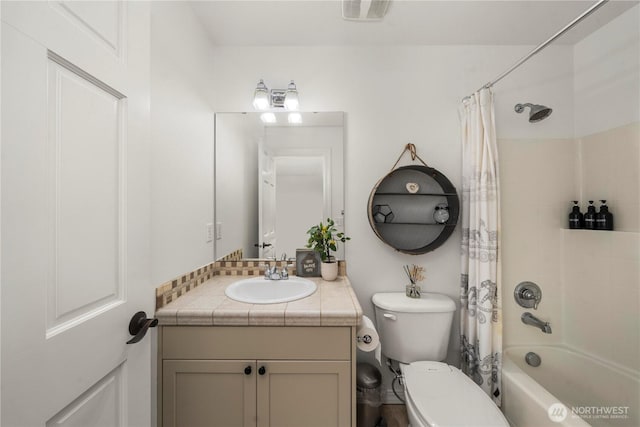 full bathroom with toilet, visible vents, shower / bath combo, and vanity