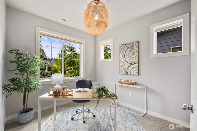 home office with baseboards, carpet, and visible vents