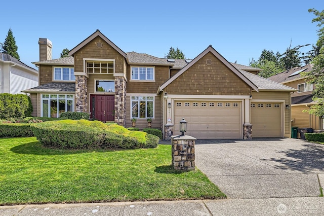 20933 37th Ave SE, Bothell, WA 98021 - view of front of home with driveway, an attached garage, a front yard, stone siding, and roof with shingles