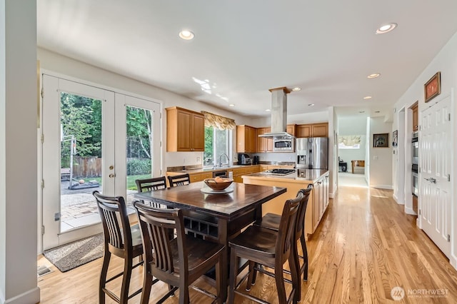 20933 37th Ave SE, Bothell, WA 98021 - dining room featuring light wood-style flooring, recessed lighting, and french doors