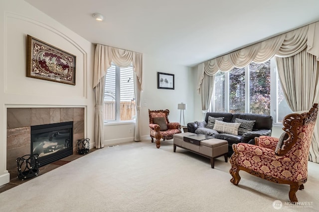 20933 37th Ave SE, Bothell, WA 98021 - living area with carpet flooring, a tile fireplace, and baseboards