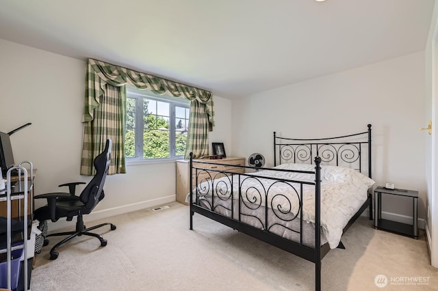 20933 37th Ave SE, Bothell, WA 98021 - bedroom with light colored carpet, a desk, and baseboards