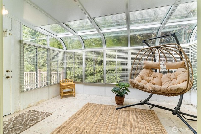 sunroom / solarium featuring plenty of natural light