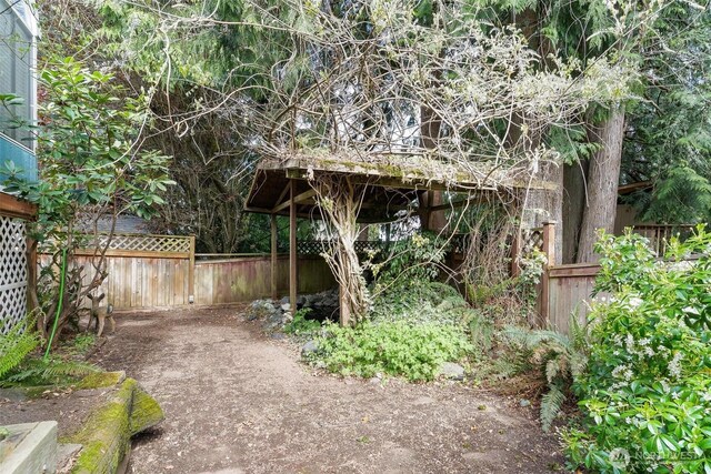 view of yard with fence