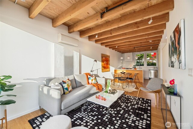 115 E Allison St, Seattle, WA 98102 - living room with an AC wall unit, beam ceiling, wooden ceiling, and wood finished floors
