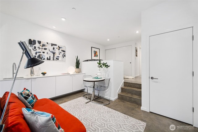115 E Allison St, Seattle, WA 98102 - sitting room with recessed lighting and concrete floors