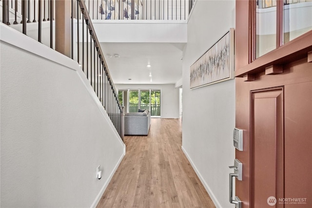 32943 Ash Ave SE, Black Diamond, WA 98010 - foyer entrance featuring light wood-style flooring, a towering ceiling, baseboards, stairway, and recessed lighting