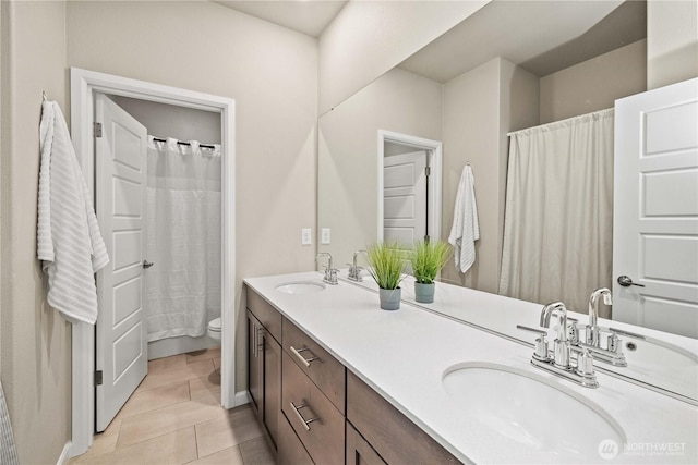 32943 Ash Ave SE, Black Diamond, WA 98010 - bathroom featuring tile patterned floors, toilet, and double vanity