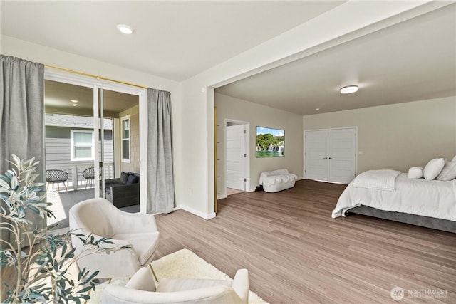 32943 Ash Ave SE, Black Diamond, WA 98010 - bedroom featuring access to outside, light wood finished floors, and baseboards