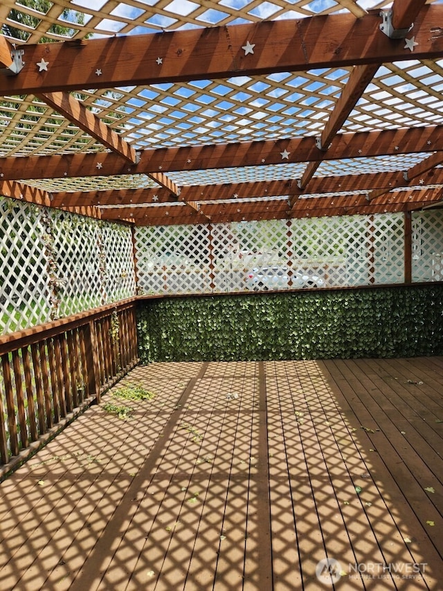 wooden deck with a pergola