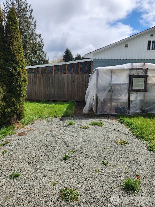 view of yard featuring fence