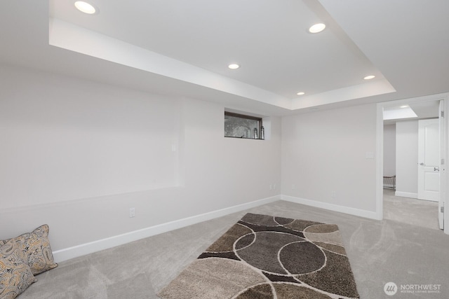 finished below grade area featuring carpet floors, baseboards, and recessed lighting