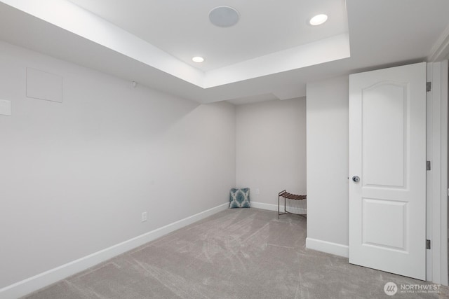 interior space featuring recessed lighting, baseboards, and carpet