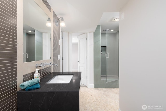 full bathroom featuring vanity and a stall shower