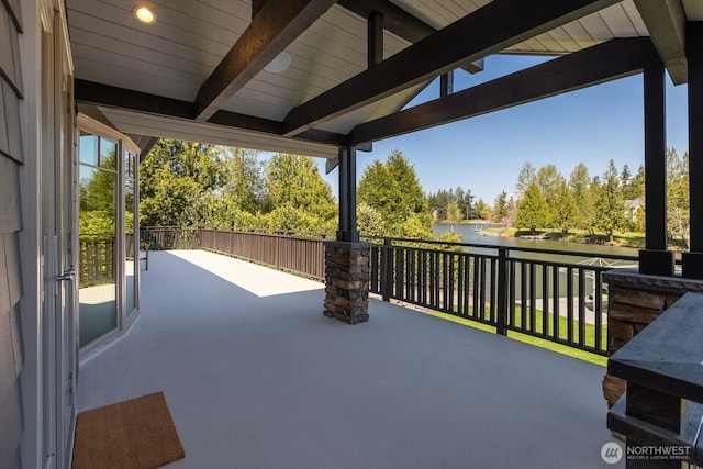 view of patio / terrace featuring a water view