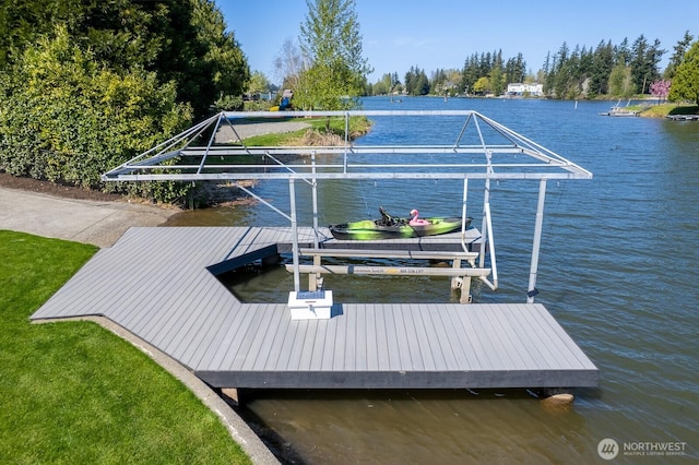 view of dock with a water view and boat lift