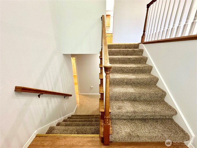 staircase with baseboards