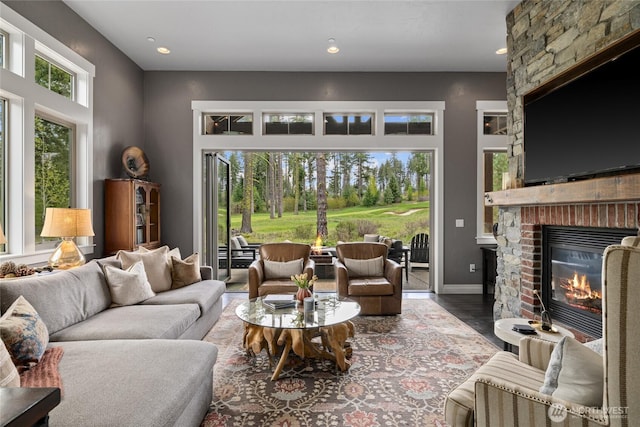 330 Maple Leaf Loop, Cle Elum, WA 98922 - living area featuring recessed lighting, a brick fireplace, and wood finished floors