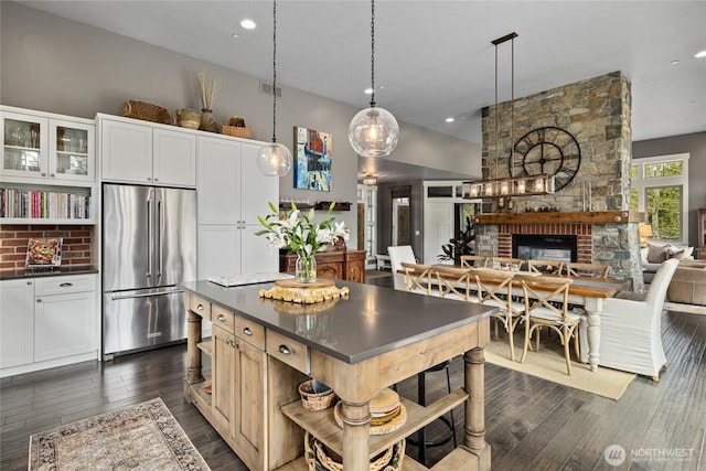 330 Maple Leaf Loop, Cle Elum, WA 98922 - kitchen with high end refrigerator, dark countertops, and open shelves