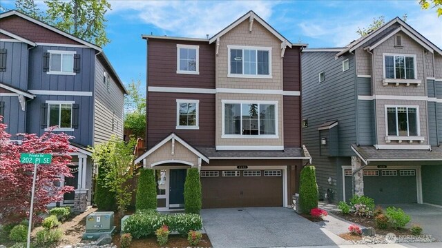 view of front of home with an attached garage and driveway
