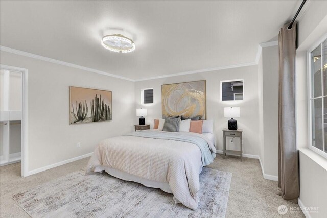 bedroom with baseboards, carpet flooring, and ornamental molding