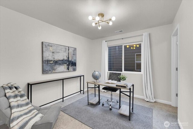 carpeted office space featuring an inviting chandelier, baseboards, and visible vents