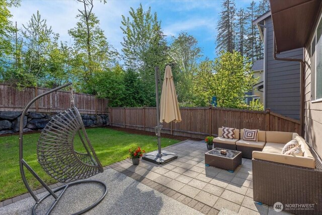 view of patio / terrace featuring a fenced backyard and an outdoor hangout area