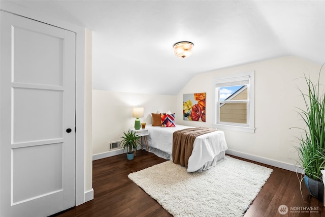 4215 N 27th St, Tacoma, WA 98407 - bedroom with visible vents, baseboards, dark wood-style flooring, and lofted ceiling