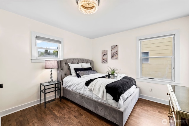 4215 N 27th St, Tacoma, WA 98407 - bedroom with baseboards and wood finished floors