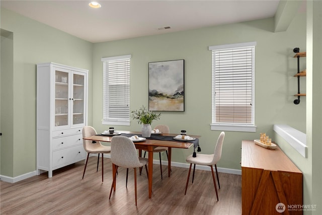 office area with light wood-type flooring, baseboards, and recessed lighting