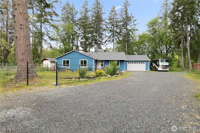 15627 240th St E, Graham, WA 98338 - view of front of property with a garage and driveway