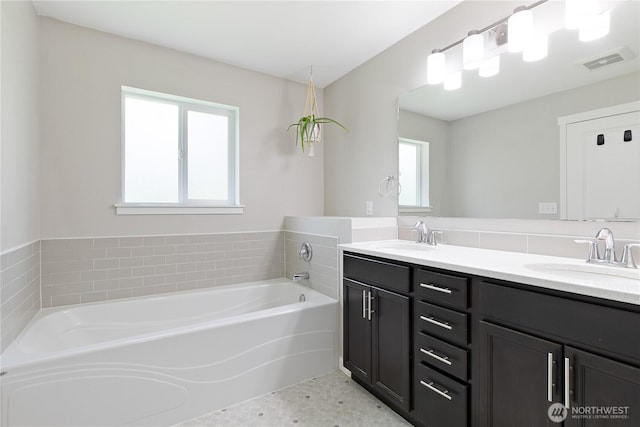 15627 240th St E, Graham, WA 98338 - full bathroom featuring double vanity and a garden tub