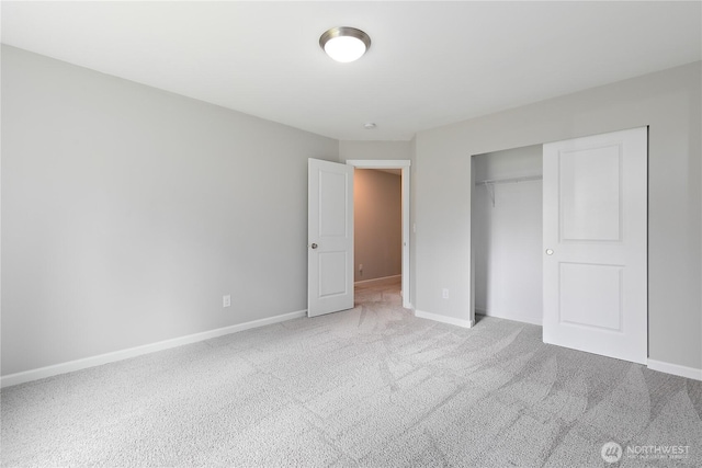 15627 240th St E, Graham, WA 98338 - unfurnished bedroom featuring carpet floors, baseboards, and a closet